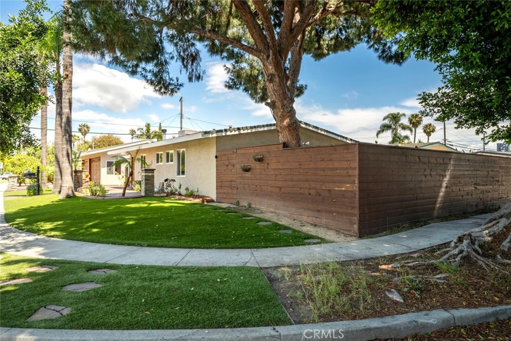 1238 North Studebaker Road Long Beach, CA 90815 - Photo 42 of 47 a view of a house with a yard
