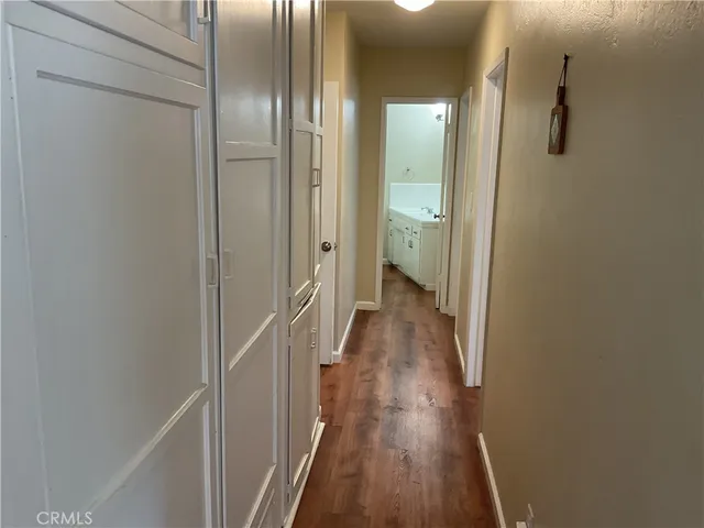 a view of a bathroom from the hallway