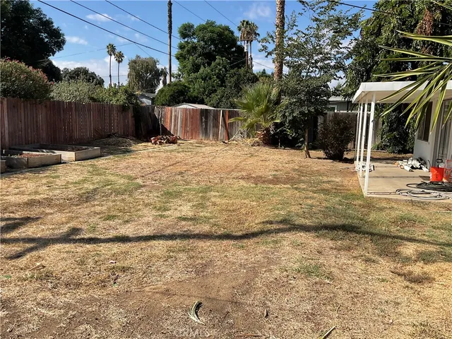 a view of a backyard of a house