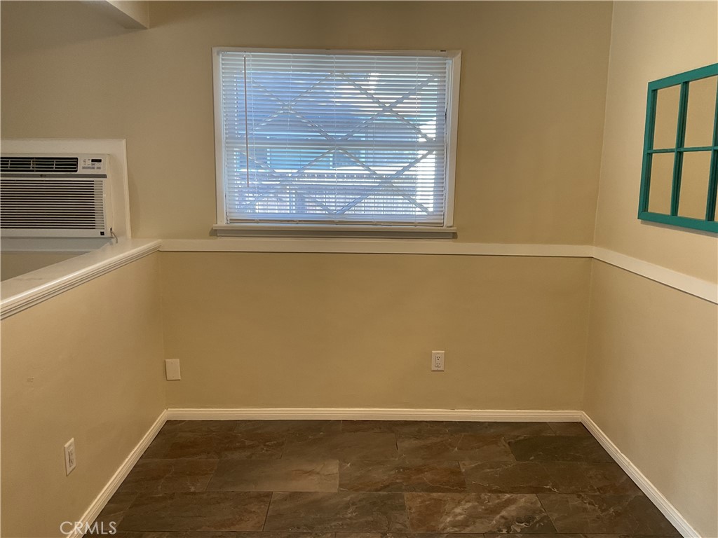 7570 Delaware Street Riverside, CA 92504 - Photo 7 of 21 an empty room with windows