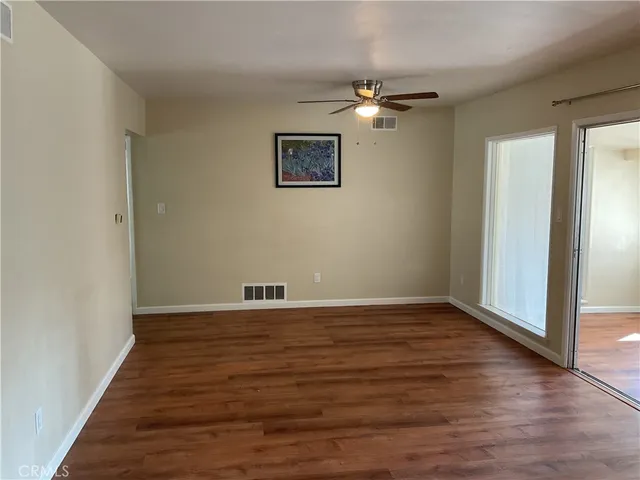 a view of a livingroom with wooden floor