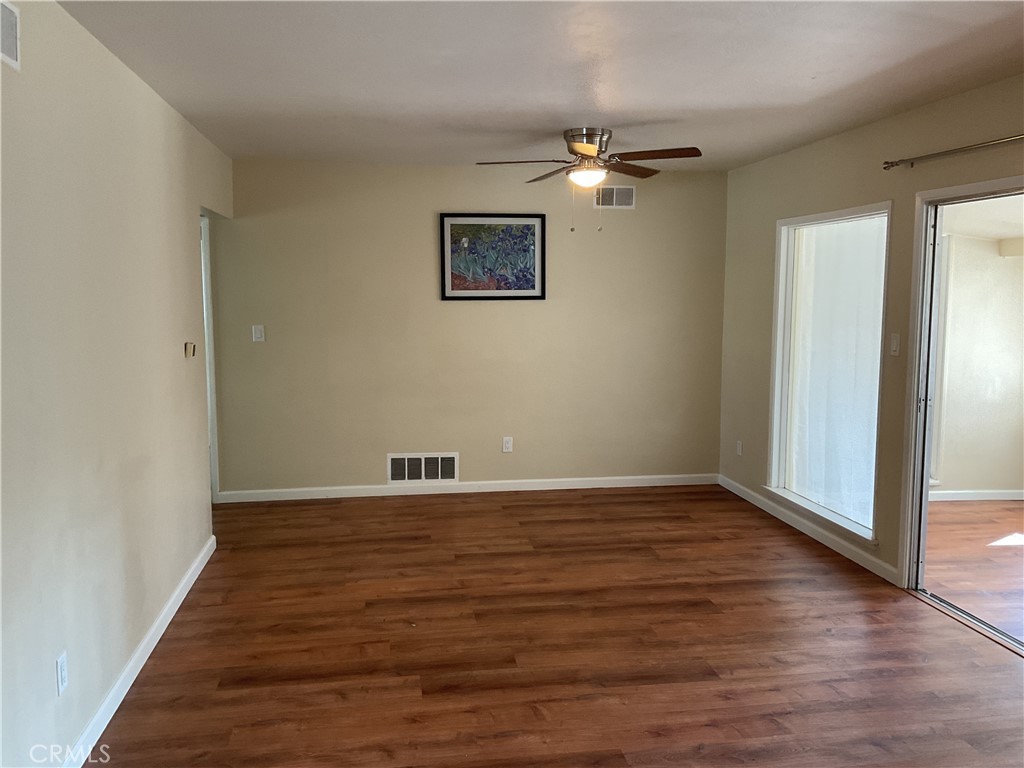 7570 Delaware Street Riverside, CA 92504 - Photo 10 of 21 a view of a livingroom with wooden floor