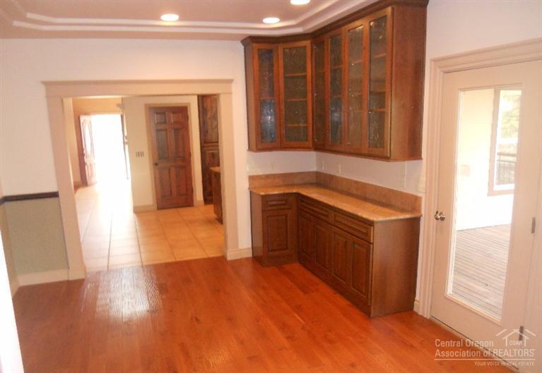 60120 East Ridgeview Drive Bend, OR 97702 - Photo 9 of 14 a kitchen with a refrigerator and a sink