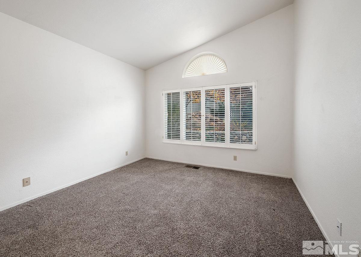 6209 Alpine Meadows Road Reno, NV 89519 - Photo 13 of 23 an empty room with windows