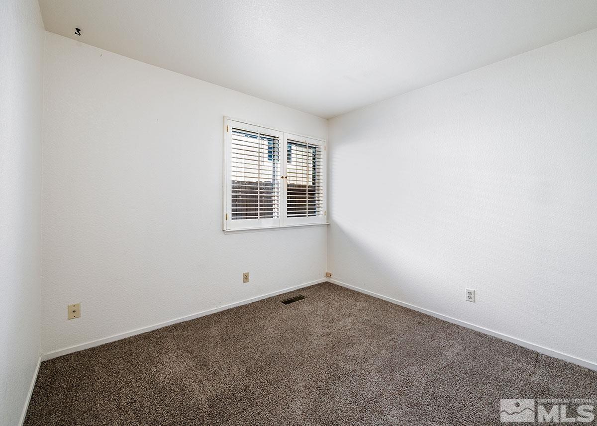6209 Alpine Meadows Road Reno, NV 89519 - Photo 16 of 23 a view of an empty room with a window