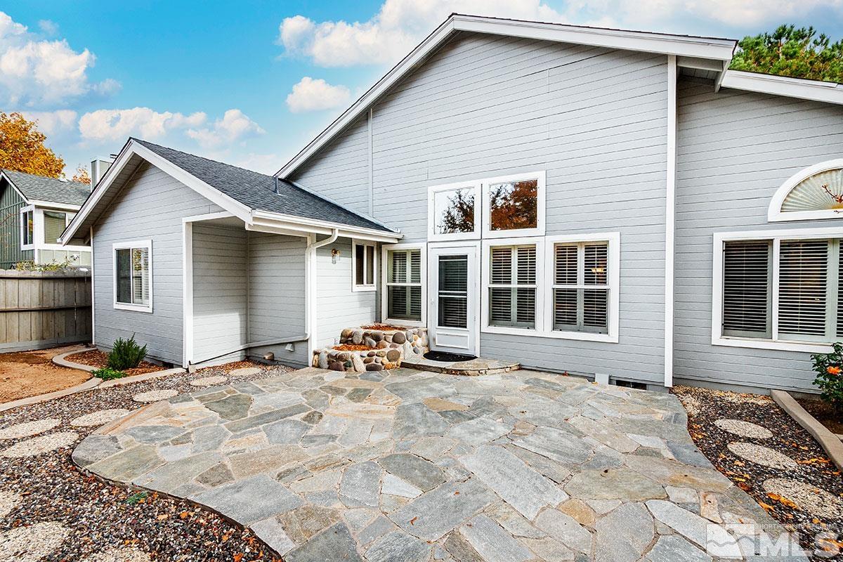 6209 Alpine Meadows Road Reno, NV 89519 - Photo 17 of 23 a front view of a house with patio