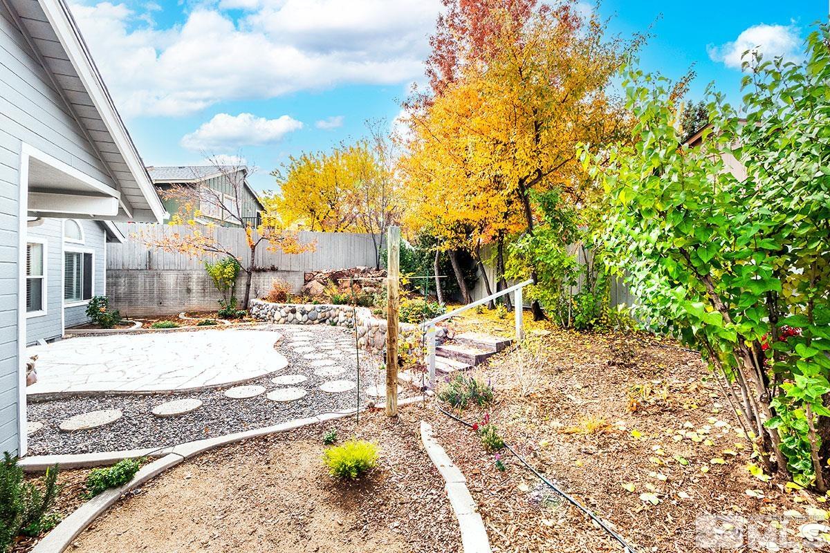 6209 Alpine Meadows Road Reno, NV 89519 - Photo 20 of 23 a view of a swimming pool with a patio