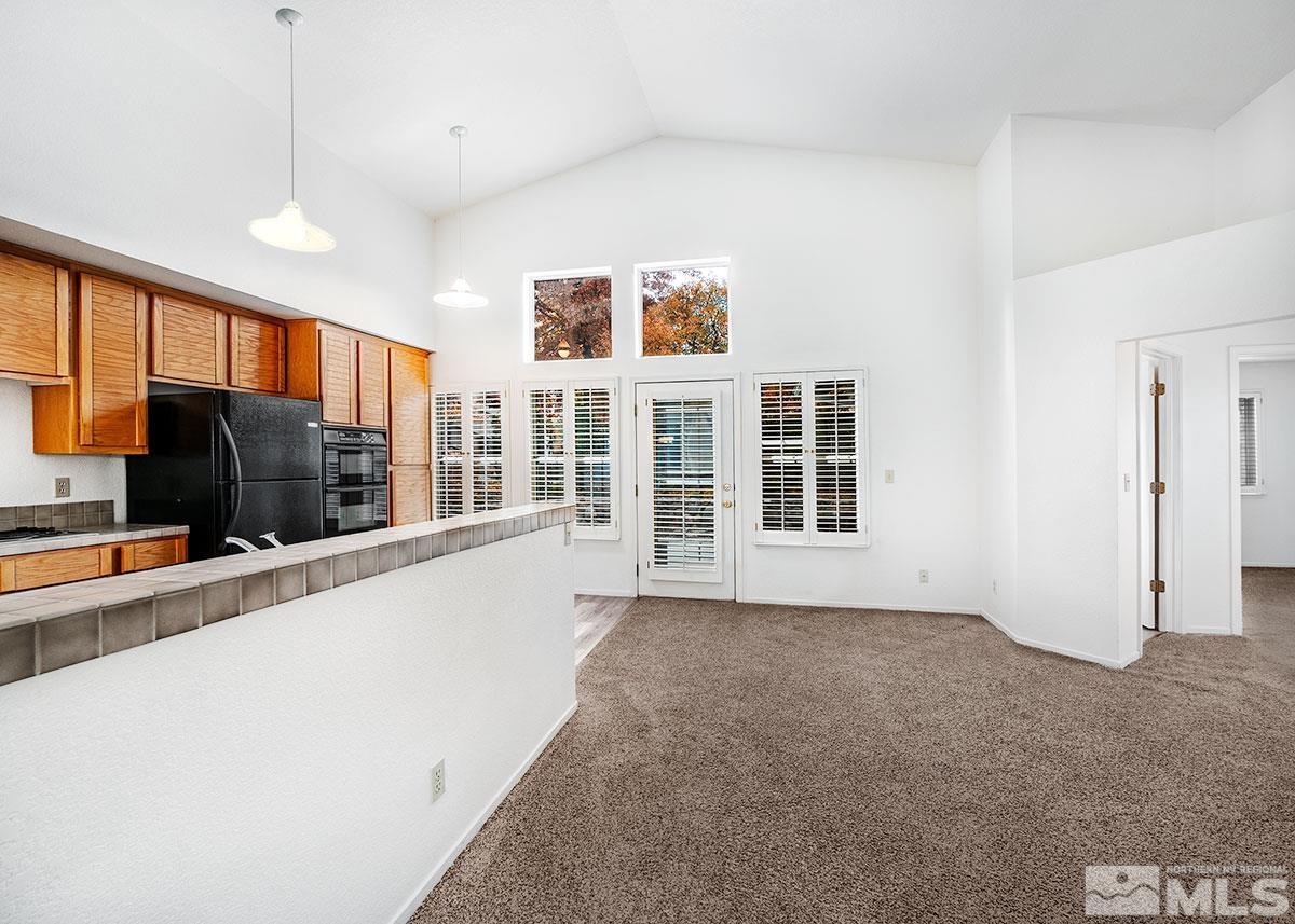 6209 Alpine Meadows Road Reno, NV 89519 - Photo 7 of 23 a view of a house with a kitchen