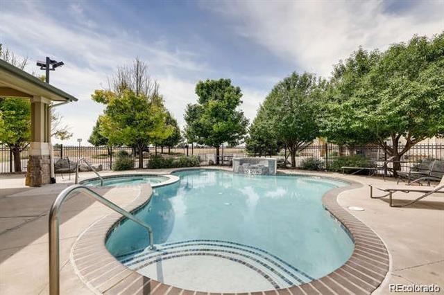 5800 Tower Road, Unit 908 Denver, CO 80249 - Photo 24 of 25 a view of outdoor space yard swimming pool and patio
