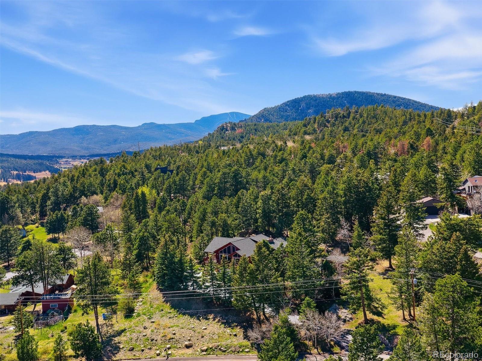 8969 South Hillview Road Morrison, CO 80465 - Photo 45 of 50 a view of a city with a mountain