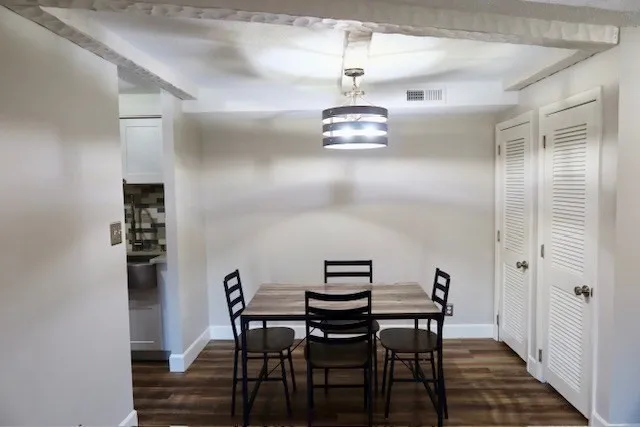 a view of a dining room with furniture