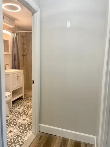 a view of a bathroom with a shower