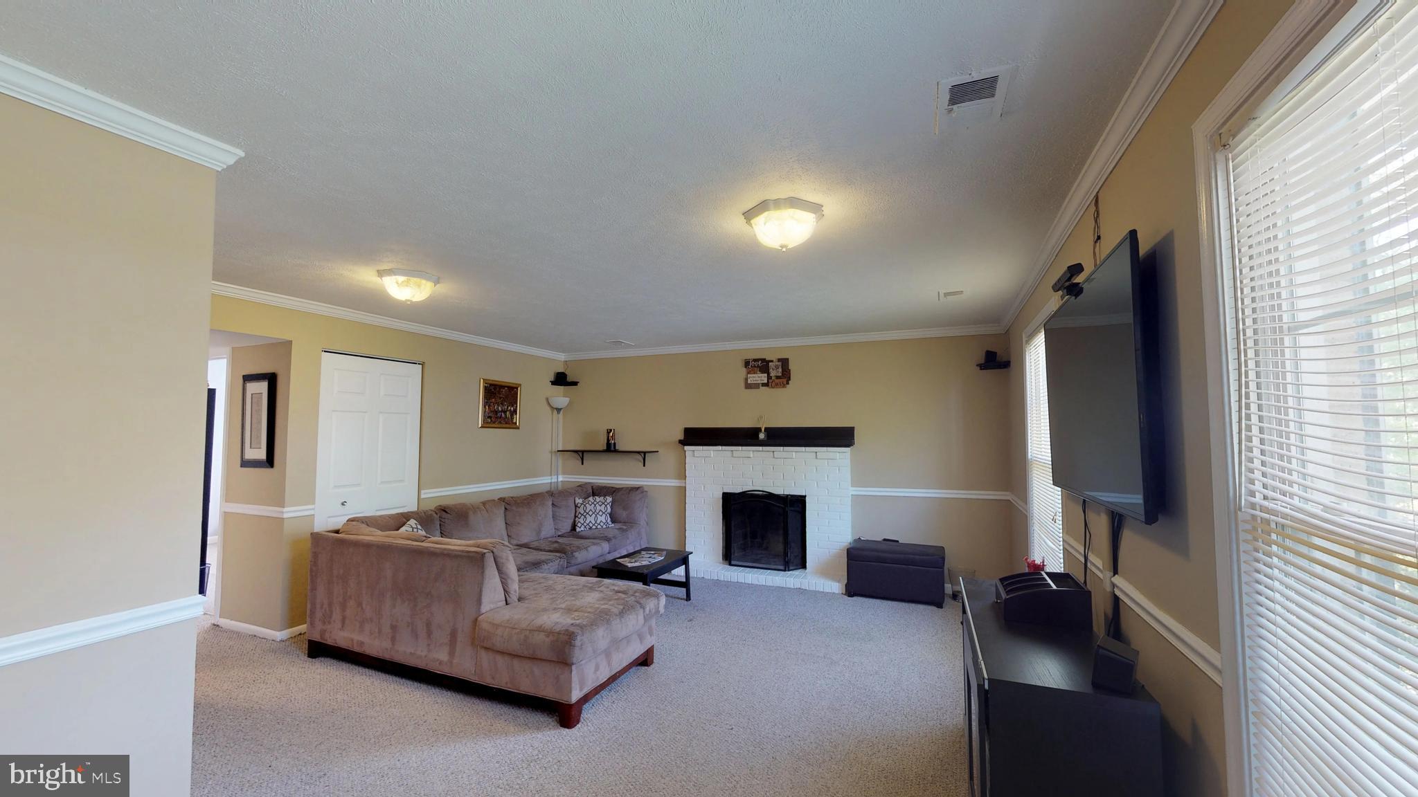 6208 Summerhill Road Temple Hills, MD 20748 - Photo 4 of 34 Family Room with fireplace