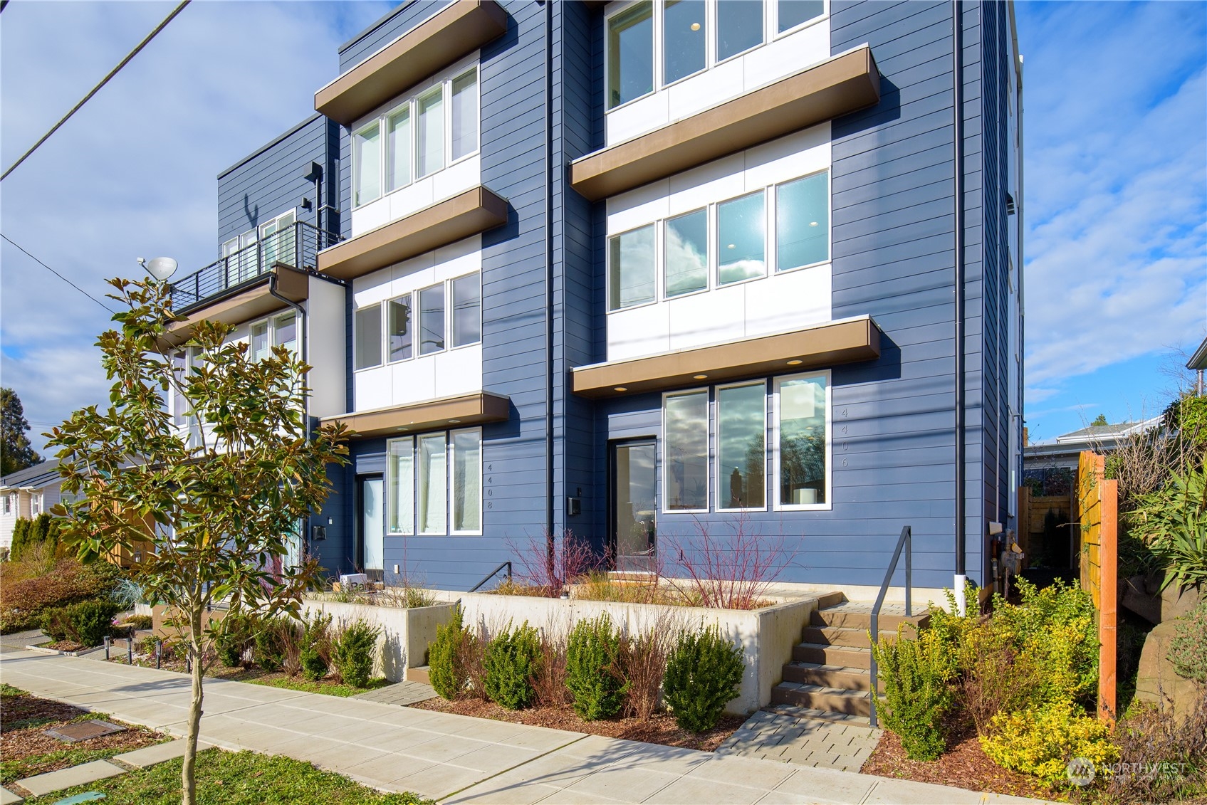 a front view of a multi story residential apartment building