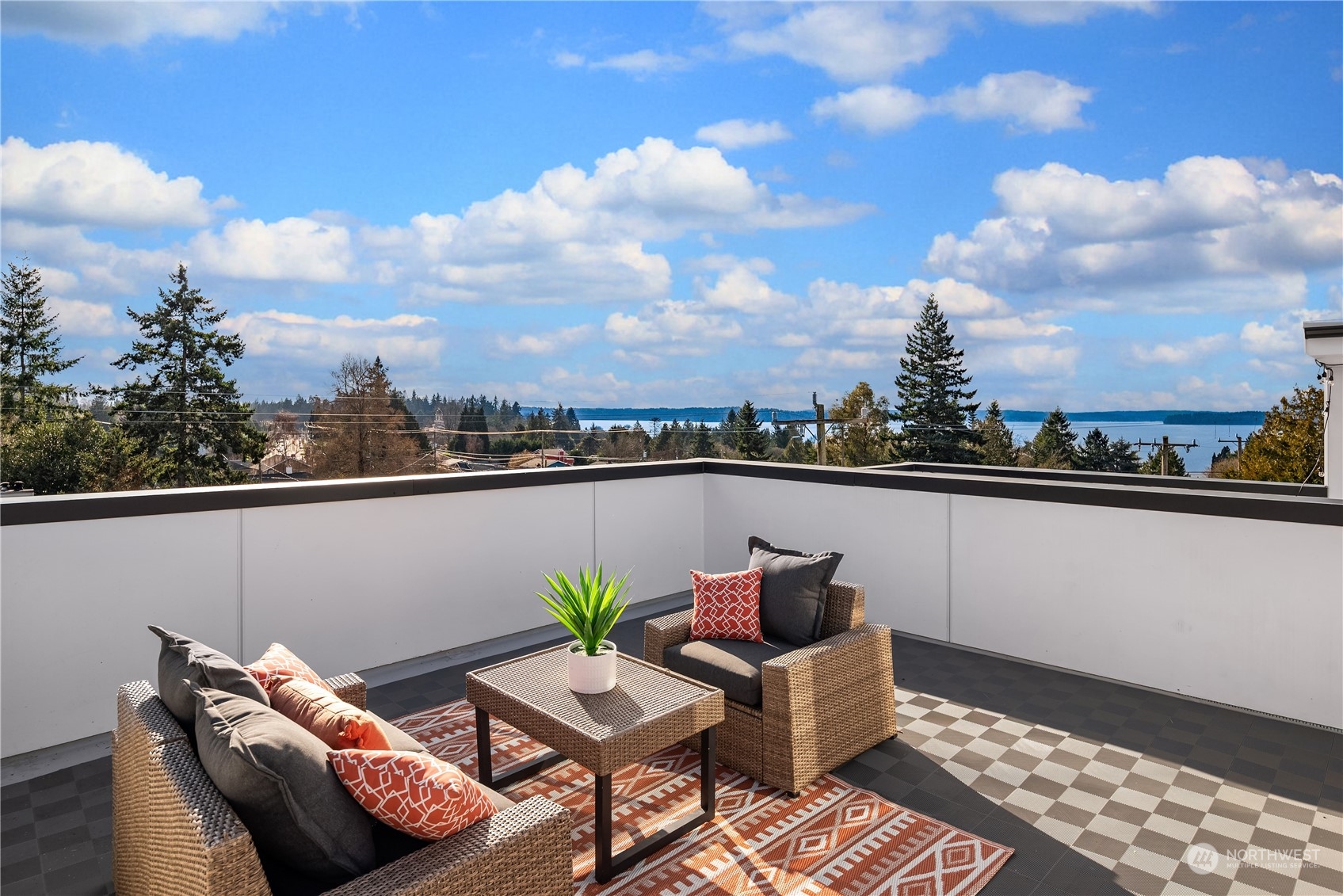 4406 Southwest Holly Street Seattle, WA 98136 - Photo 21 of 32 a balcony with outdoor seating and city view