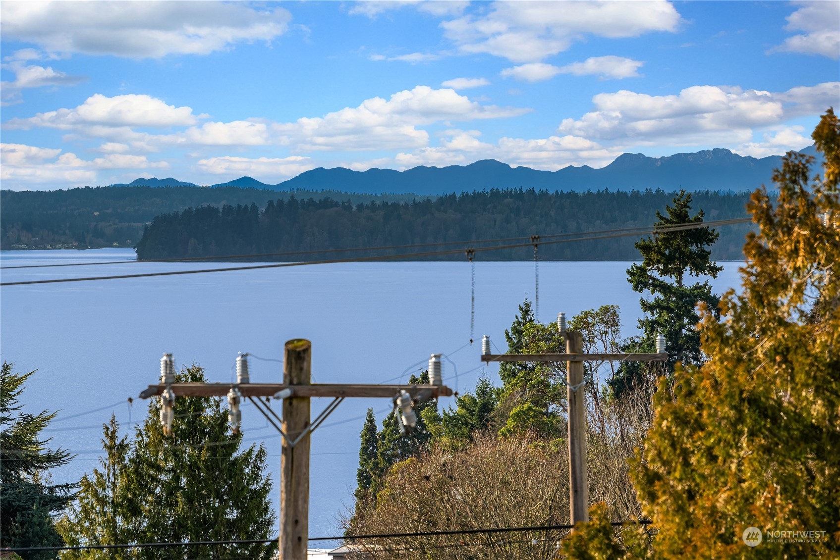 4406 Southwest Holly Street Seattle, WA 98136 - Photo 23 of 32 a view of a lake in middle of the house