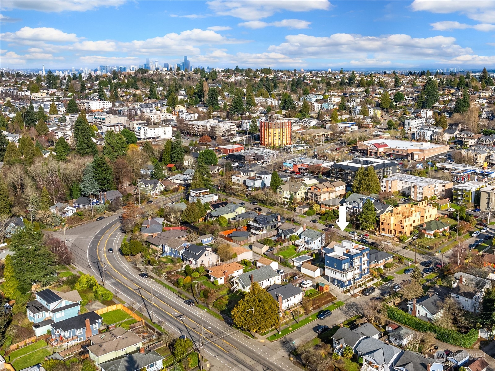 4406 Southwest Holly Street Seattle, WA 98136 - Photo 28 of 32 an aerial view of residential houses with outdoor space