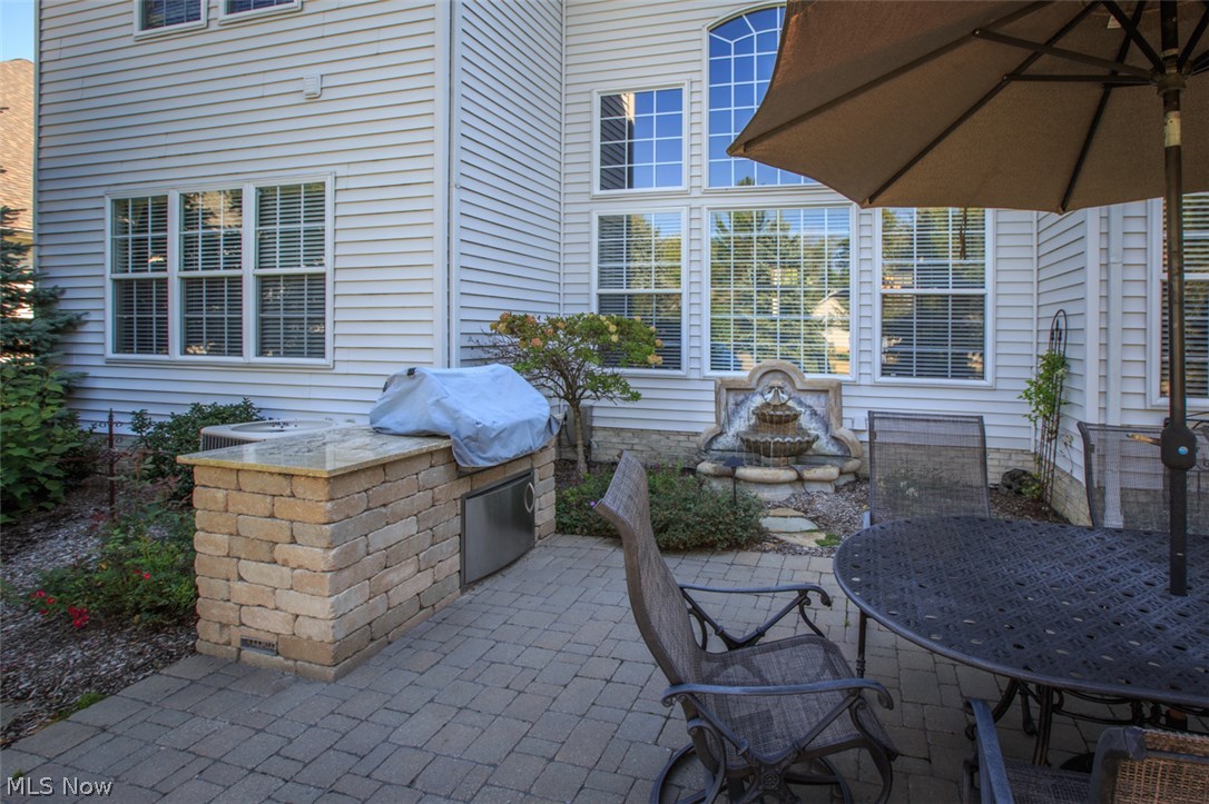 322 Burwick Road Cleveland, OH 44143 - Photo 20 of 25 Beautiful stone patioWith built-in grill and waterfall feature!