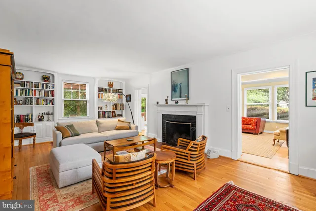 a living room with furniture and windows