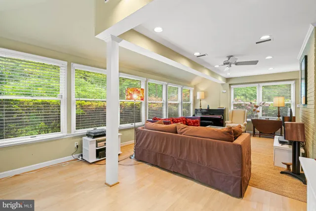 a view of a dining room with furniture and a table