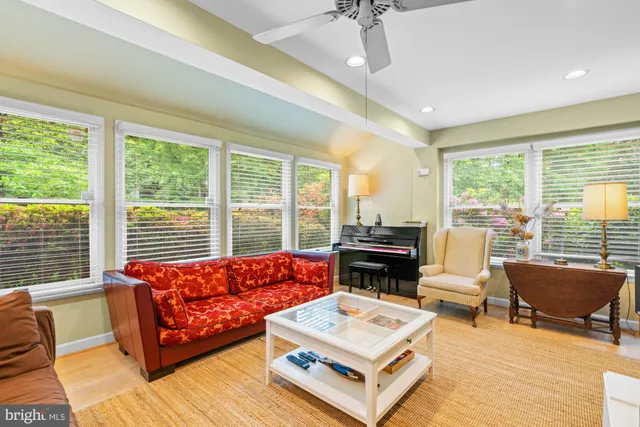 a bedroom with a bed and a table in it