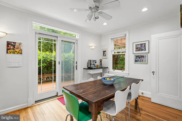 a view of a park with a tree in the background