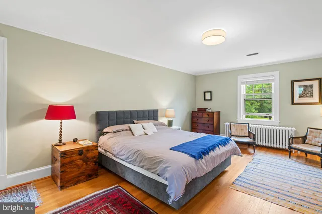 a view of balcony with wooden floor and outdoor seating