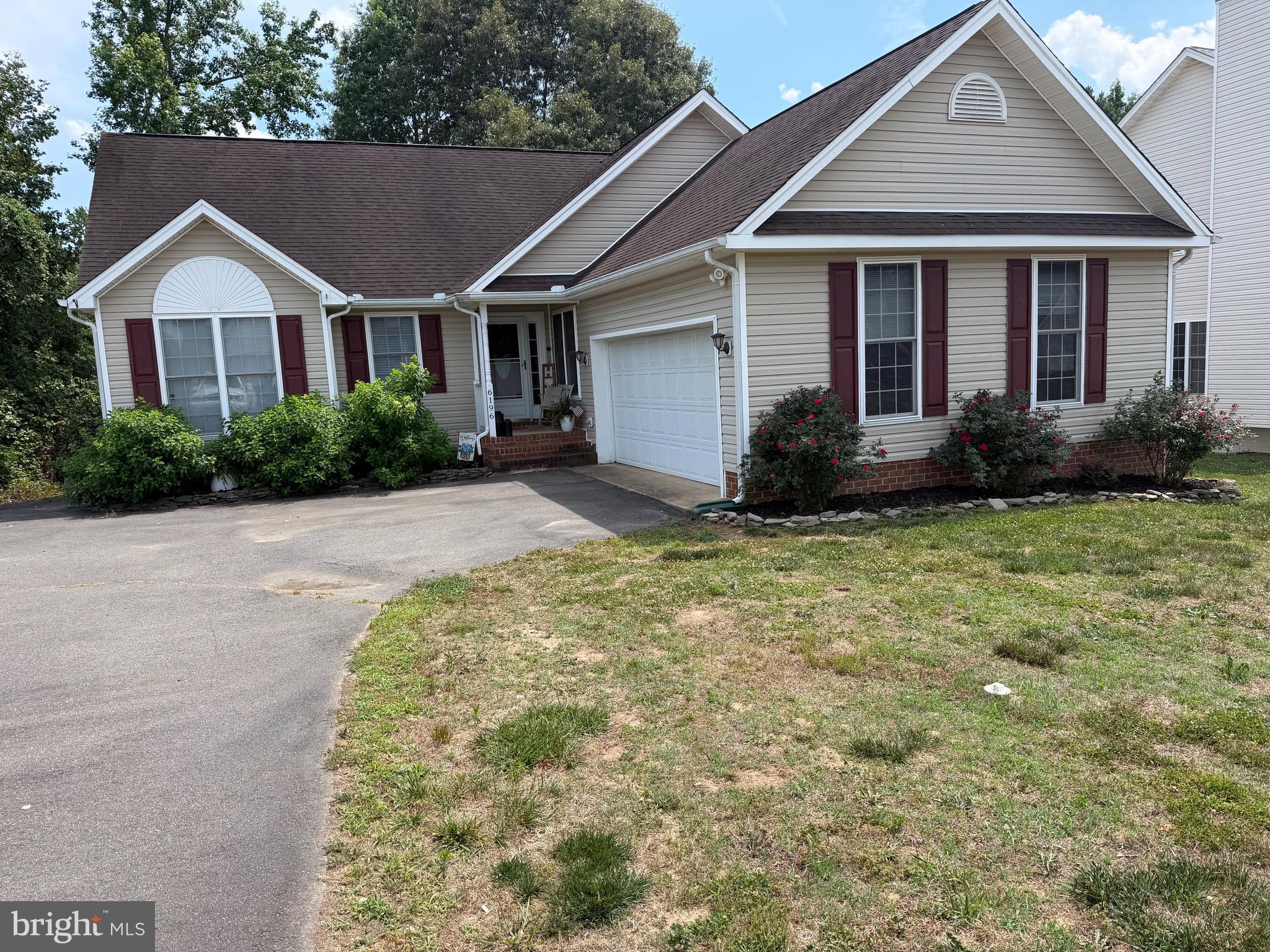 6196 Derby Way Ruther Glen, VA 22546 - Photo 2 of 2 a view of a house with backyard and garden