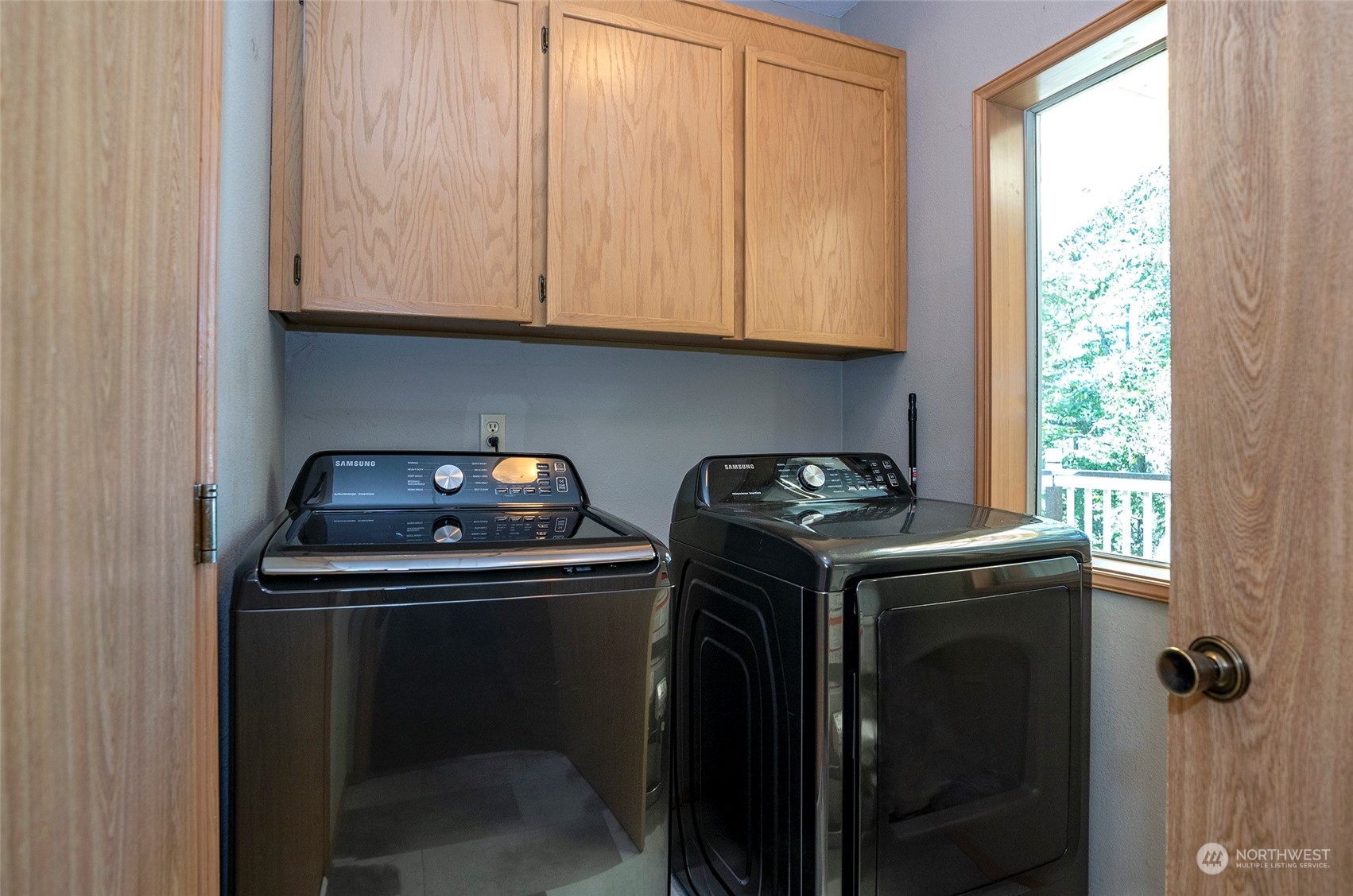 2833 Marietta Street Steilacoom, WA 98388 - Photo 17 of 40 a view of storage and utility room with washer and dryer