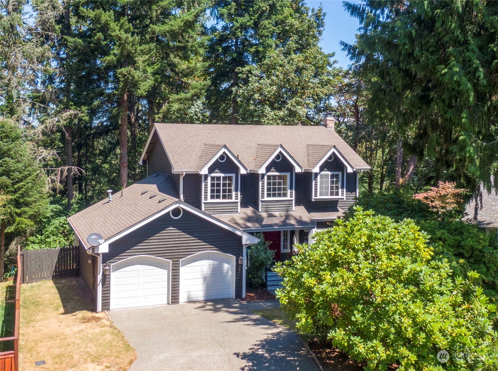 2833 Marietta Street Steilacoom, WA 98388 - Photo 2 of 40 a front view of a house with a yard and garage