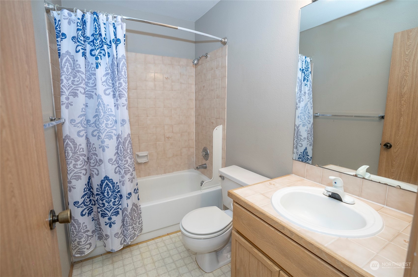 2833 Marietta Street Steilacoom, WA 98388 - Photo 25 of 40 a bathroom with a sink toilet and shower