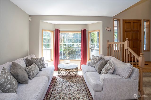 a kitchen with a refrigerator stove and sink
