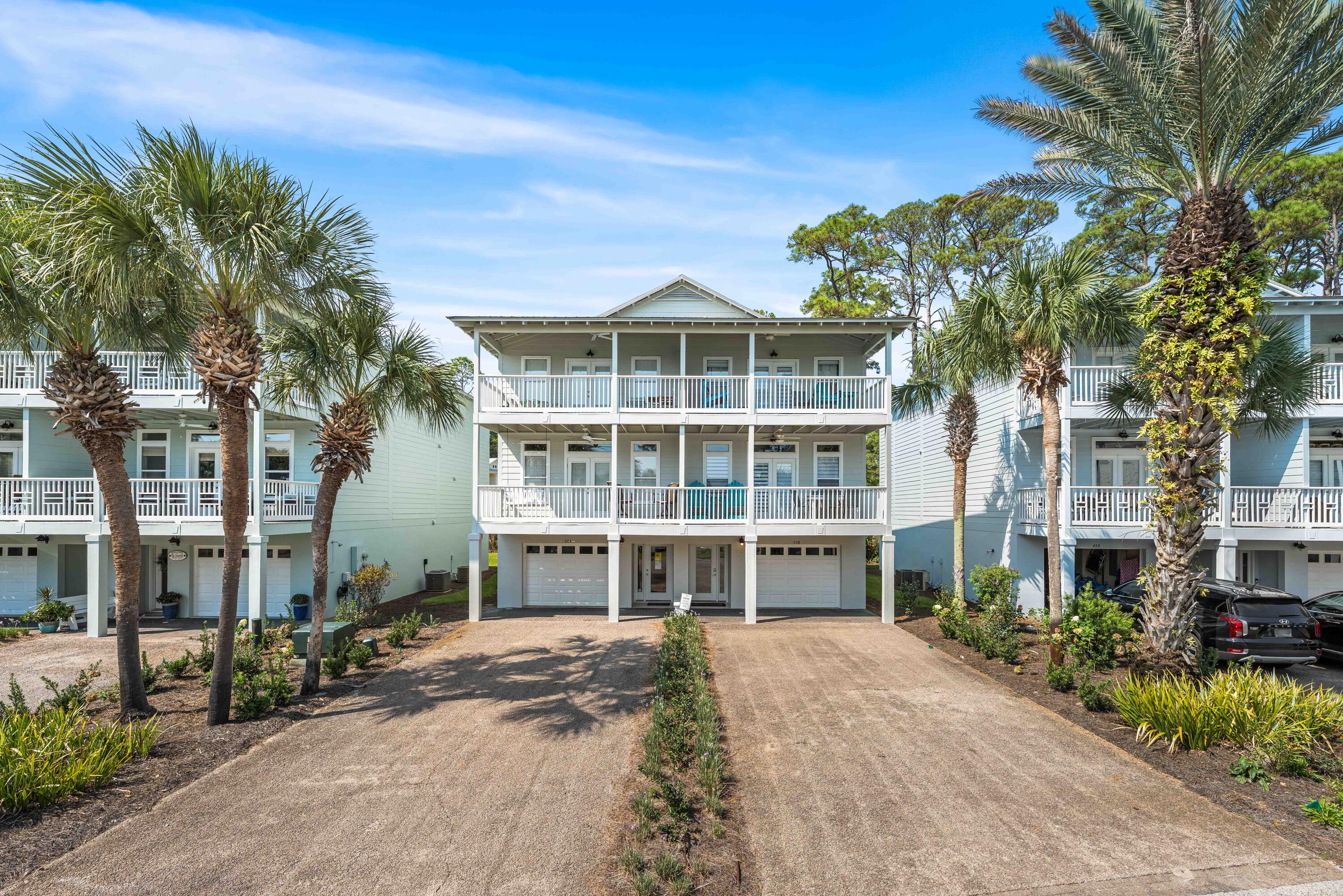 33 Dune Breeze Lane, Unit H2 Santa Rosa Beach, FL 32459 - Photo 51 of 54 a front view of a building with a garden