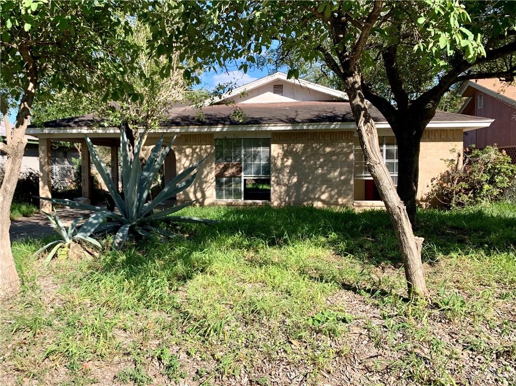 108 Tulipan Drive Edcouch, TX 78538 - Photo 1 of 1 a backyard of a house with lots of green space