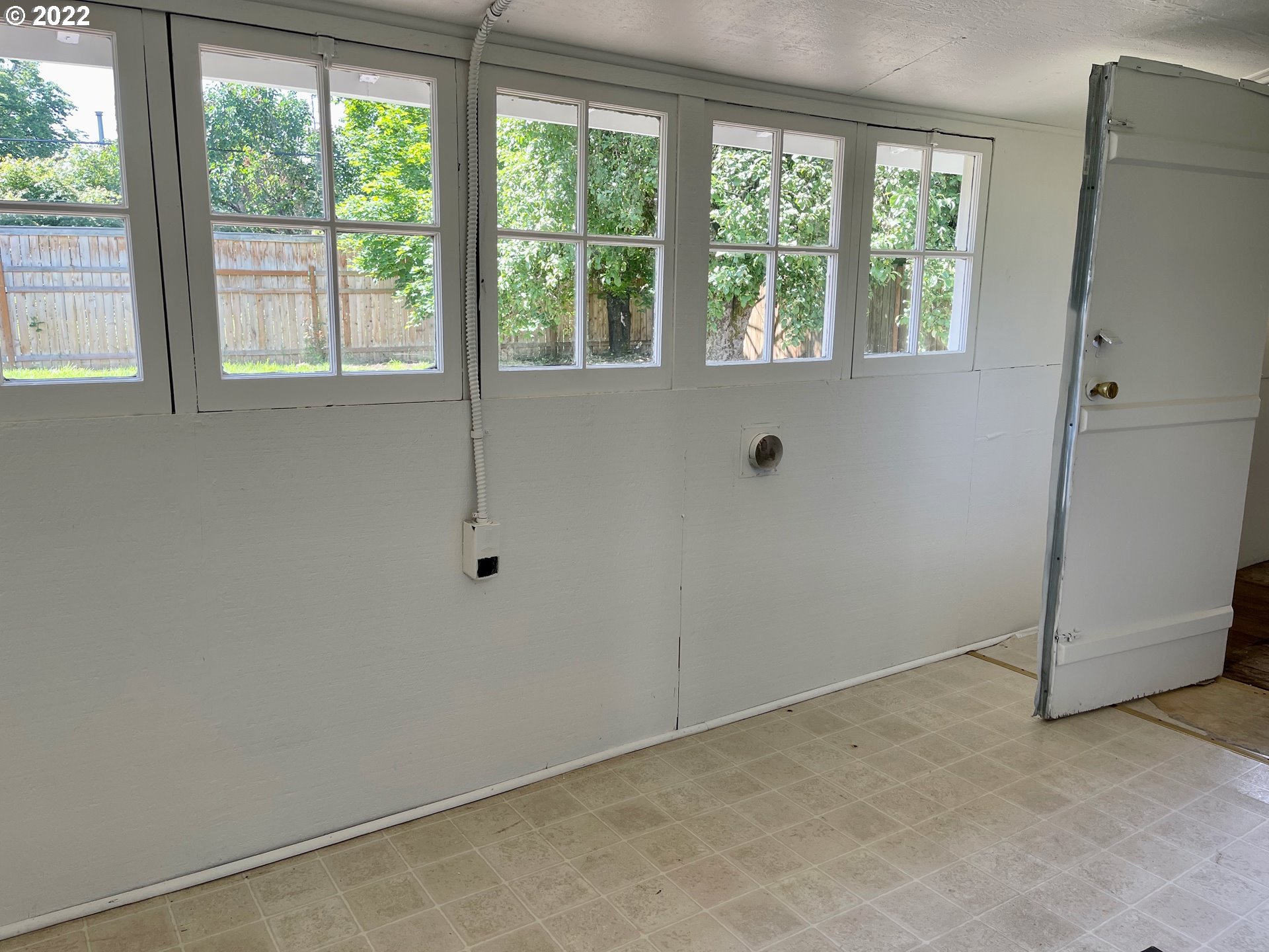 1147 F Street Springfield, OR 97477 - Photo 26 of 32 a view of a small space with a window