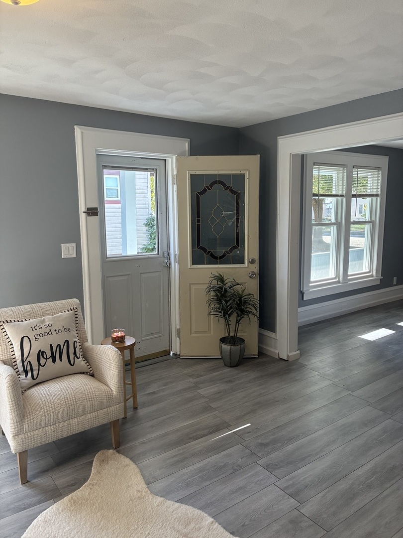 3003 Elizabeth Avenue Zion, IL 60099 - Photo 8 of 30 a living room with furniture and a flat screen tv