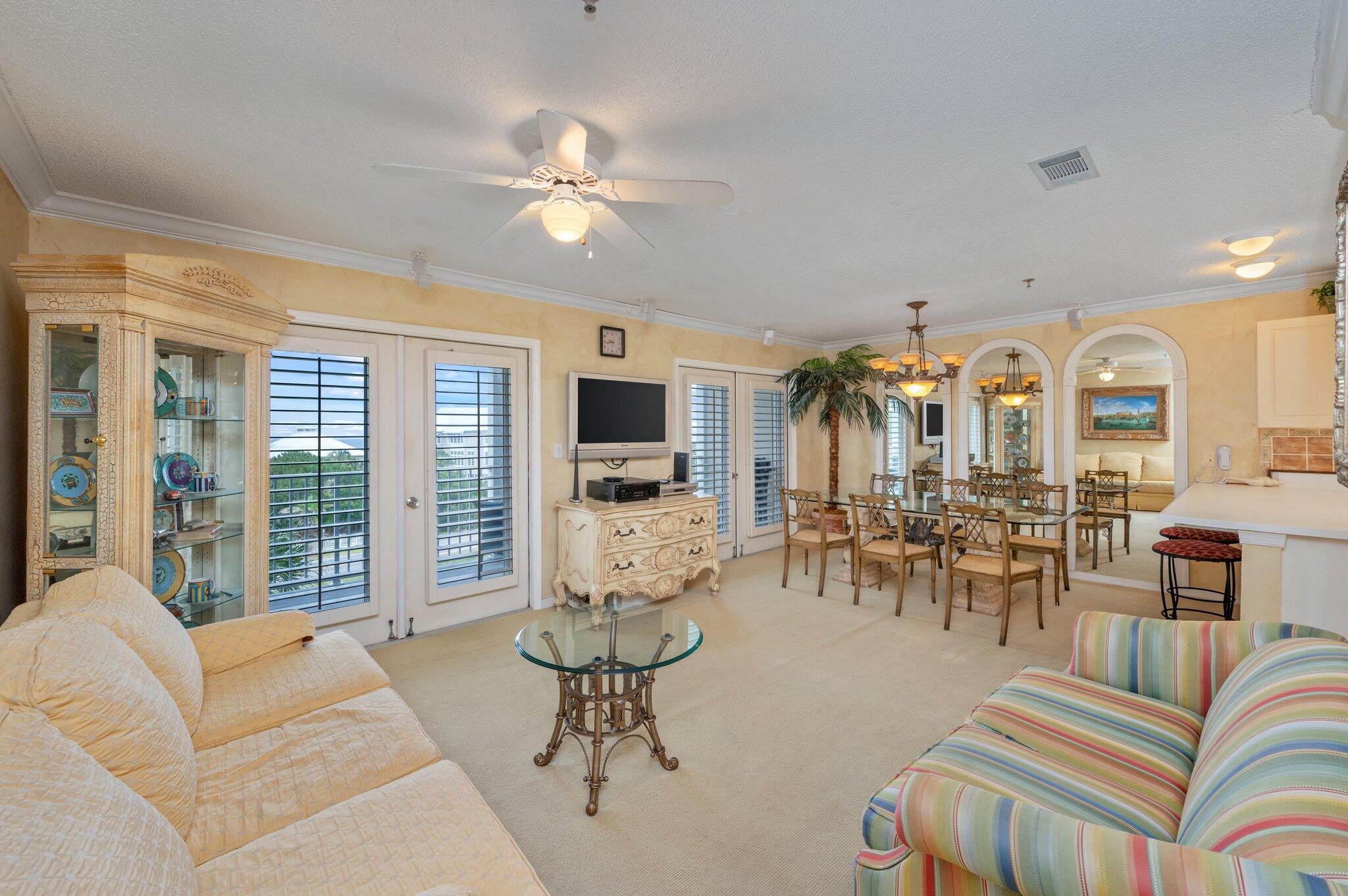144 Spires Lane, Unit 403 Santa Rosa Beach, FL 32459 - Photo 11 of 38 a living room with furniture and a large window