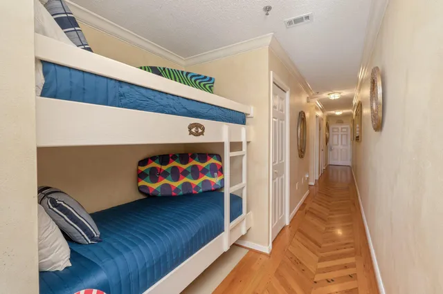 a view of a hallway with seating area