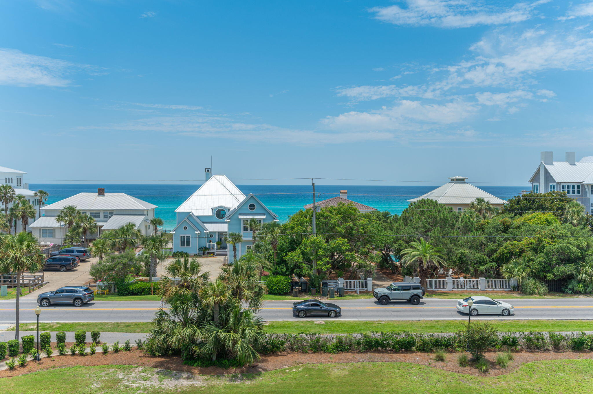 144 Spires Lane, Unit 403 Santa Rosa Beach, FL 32459 - Photo 2 of 38 a front view of a house with a yard and lake view