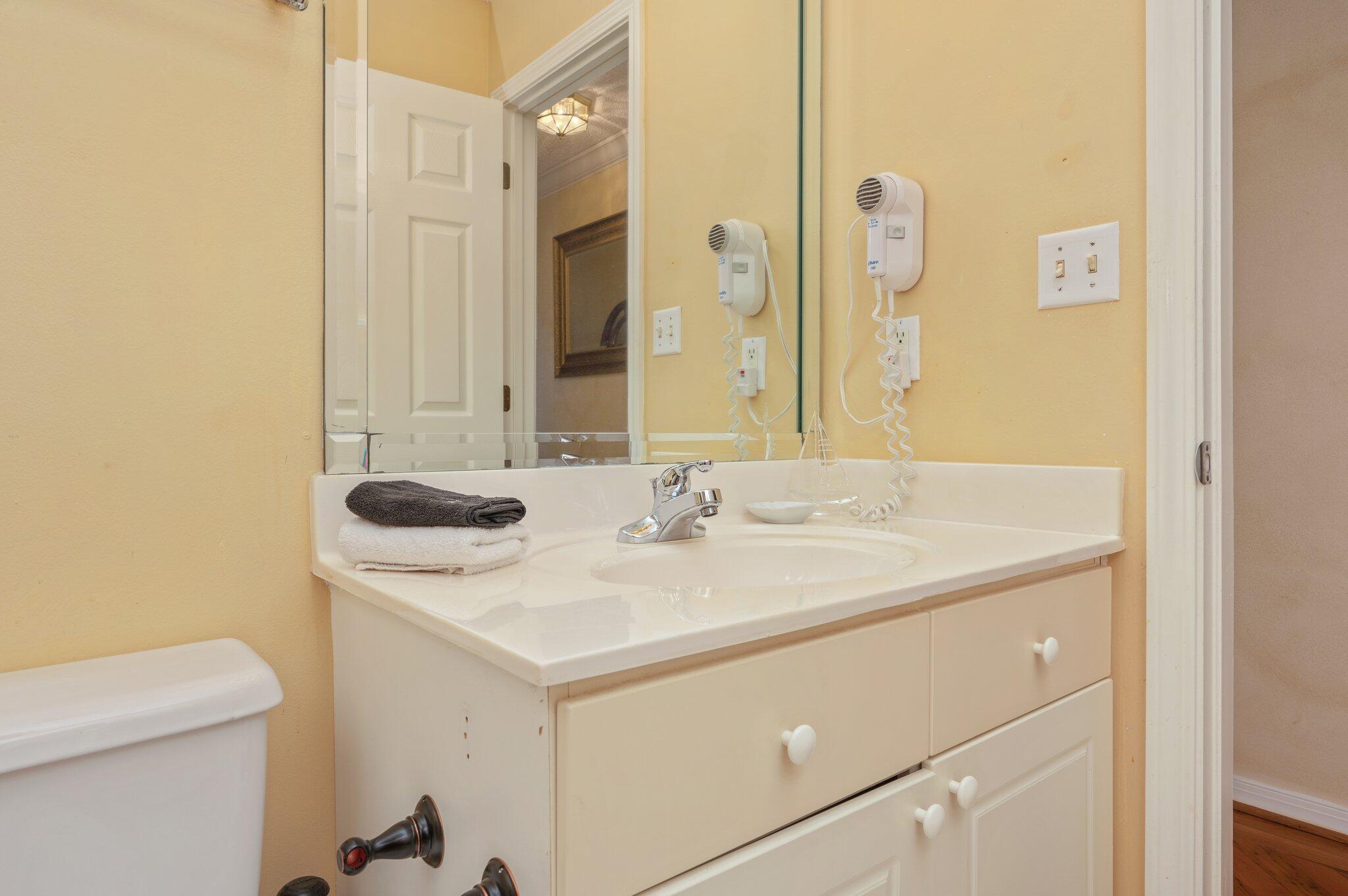 144 Spires Lane, Unit 403 Santa Rosa Beach, FL 32459 - Photo 30 of 38 a bathroom with a sink and a mirror