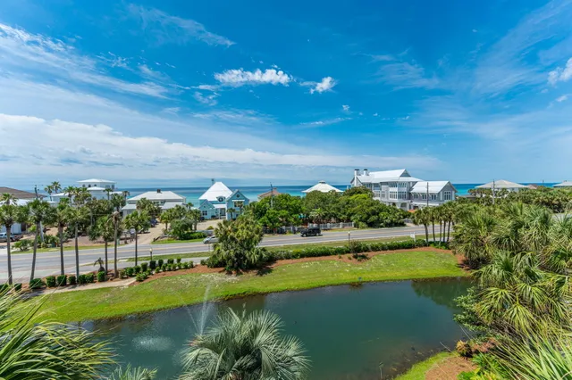 a view of a lake with a yard