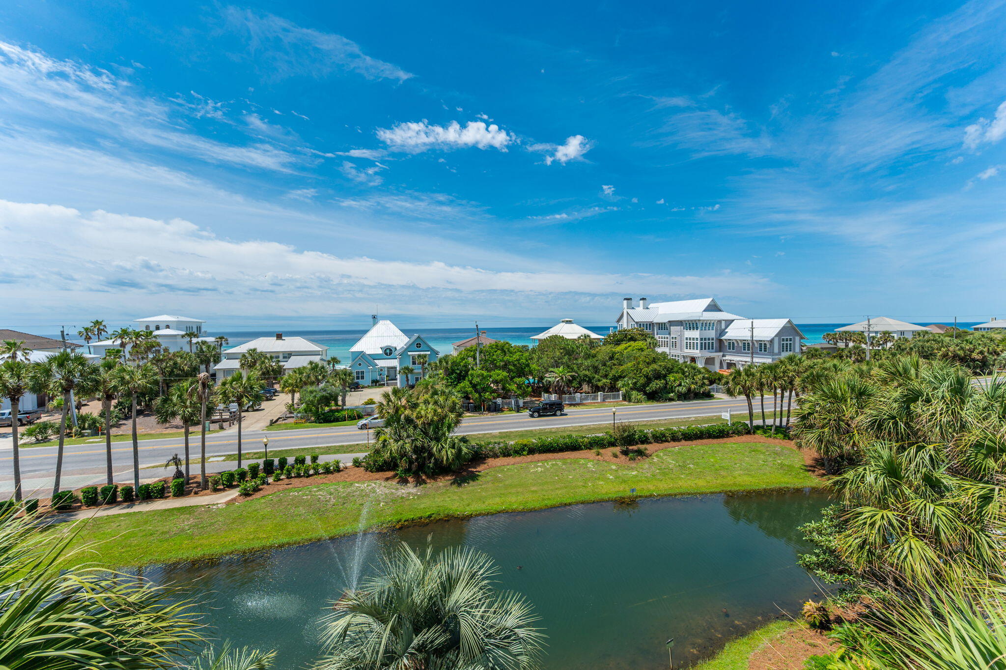 144 Spires Lane, Unit 403 Santa Rosa Beach, FL 32459 - Photo 3 of 38 a view of a lake with a yard
