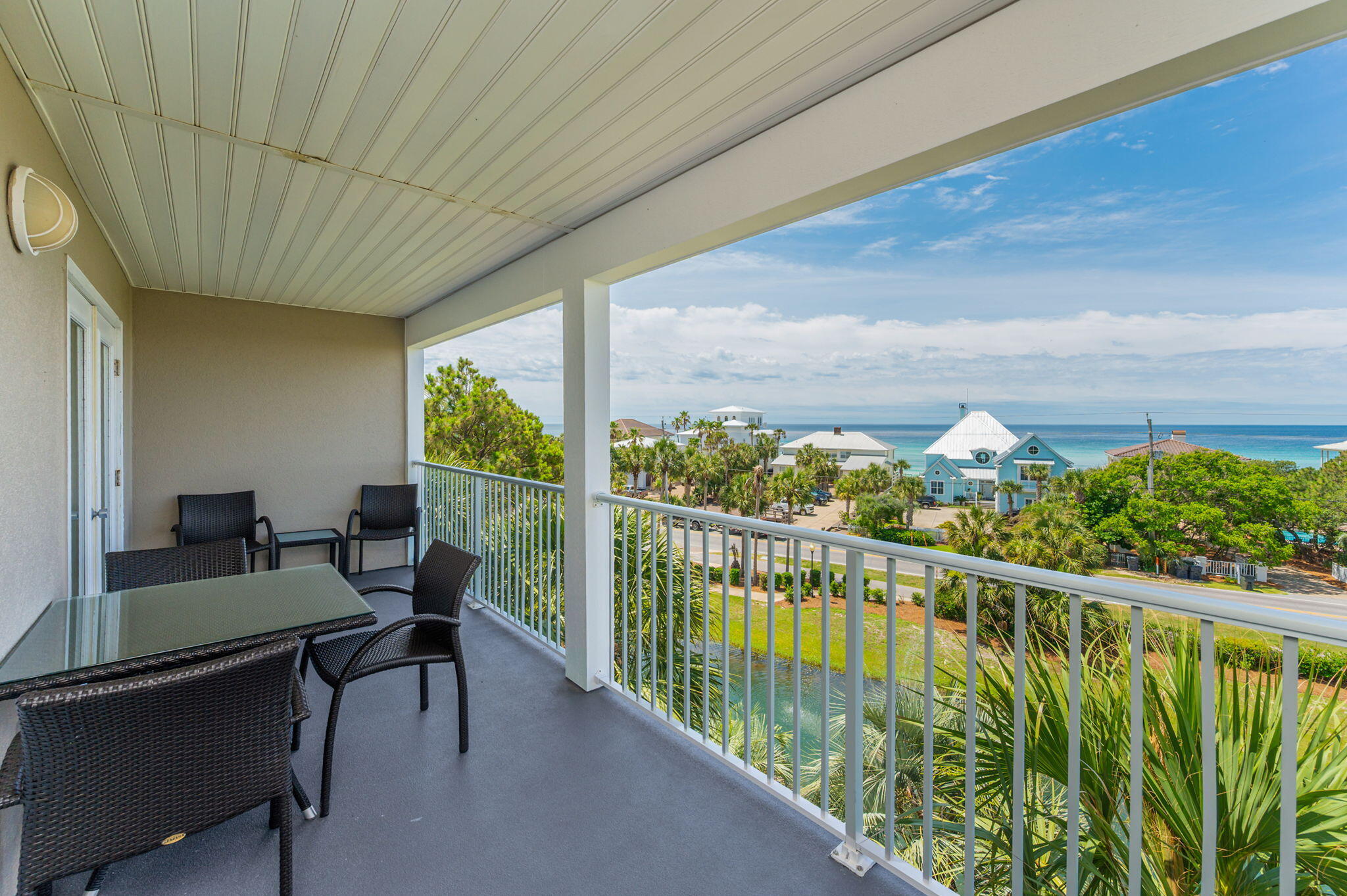 144 Spires Lane, Unit 403 Santa Rosa Beach, FL 32459 - Photo 35 of 38 a view of a balcony with chairs