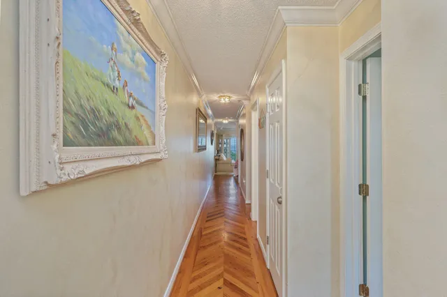 a view of a hallway with a glass door