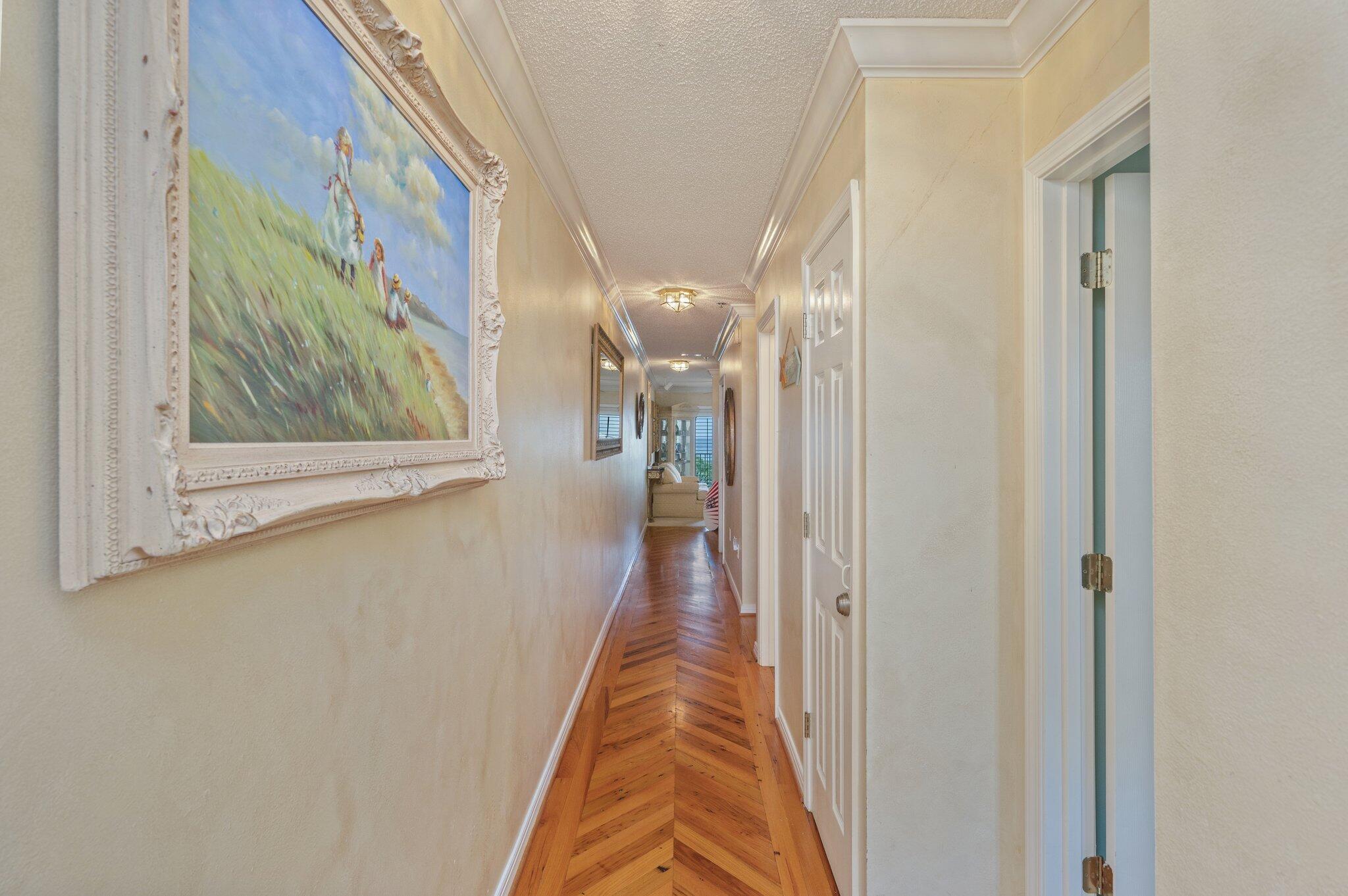 144 Spires Lane, Unit 403 Santa Rosa Beach, FL 32459 - Photo 6 of 38 a view of a hallway with a glass door