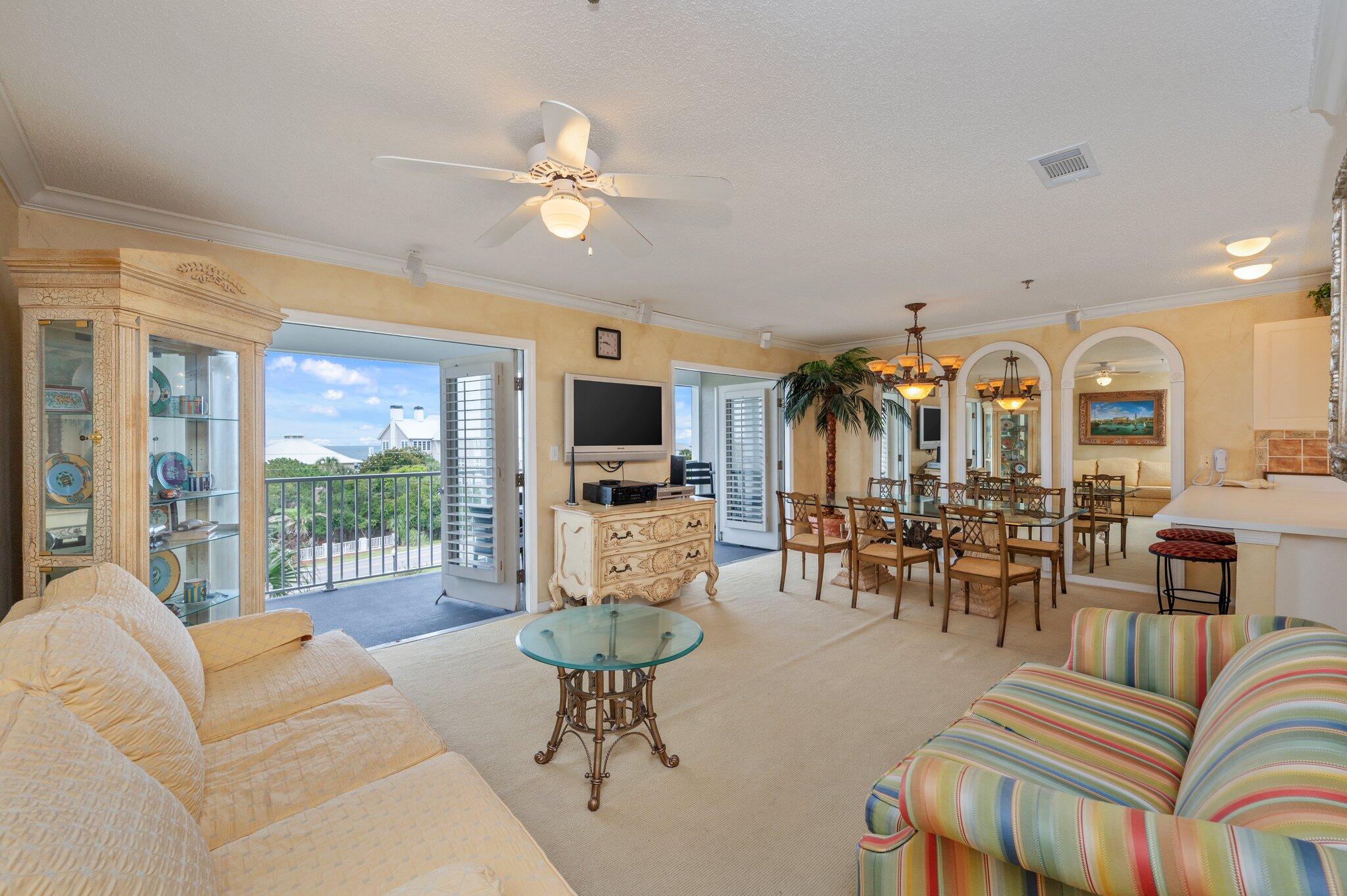 144 Spires Lane, Unit 403 Santa Rosa Beach, FL 32459 - Photo 7 of 38 a living room with furniture and a large window