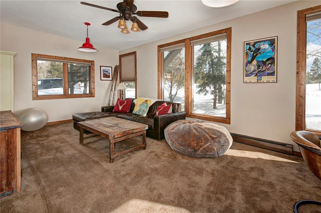 39 D Road Silverthorne, CO 80498 - Photo 16 of 35 a living room with furniture and a large window
