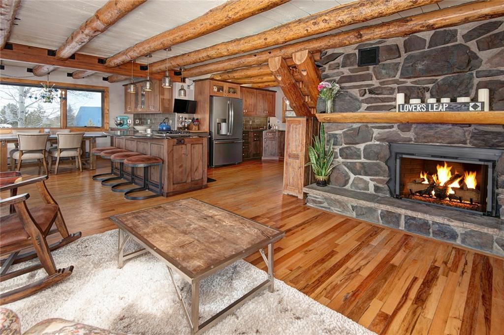 39 D Road Silverthorne, CO 80498 - Photo 9 of 35 a living room filled with lots of furniture and a rug