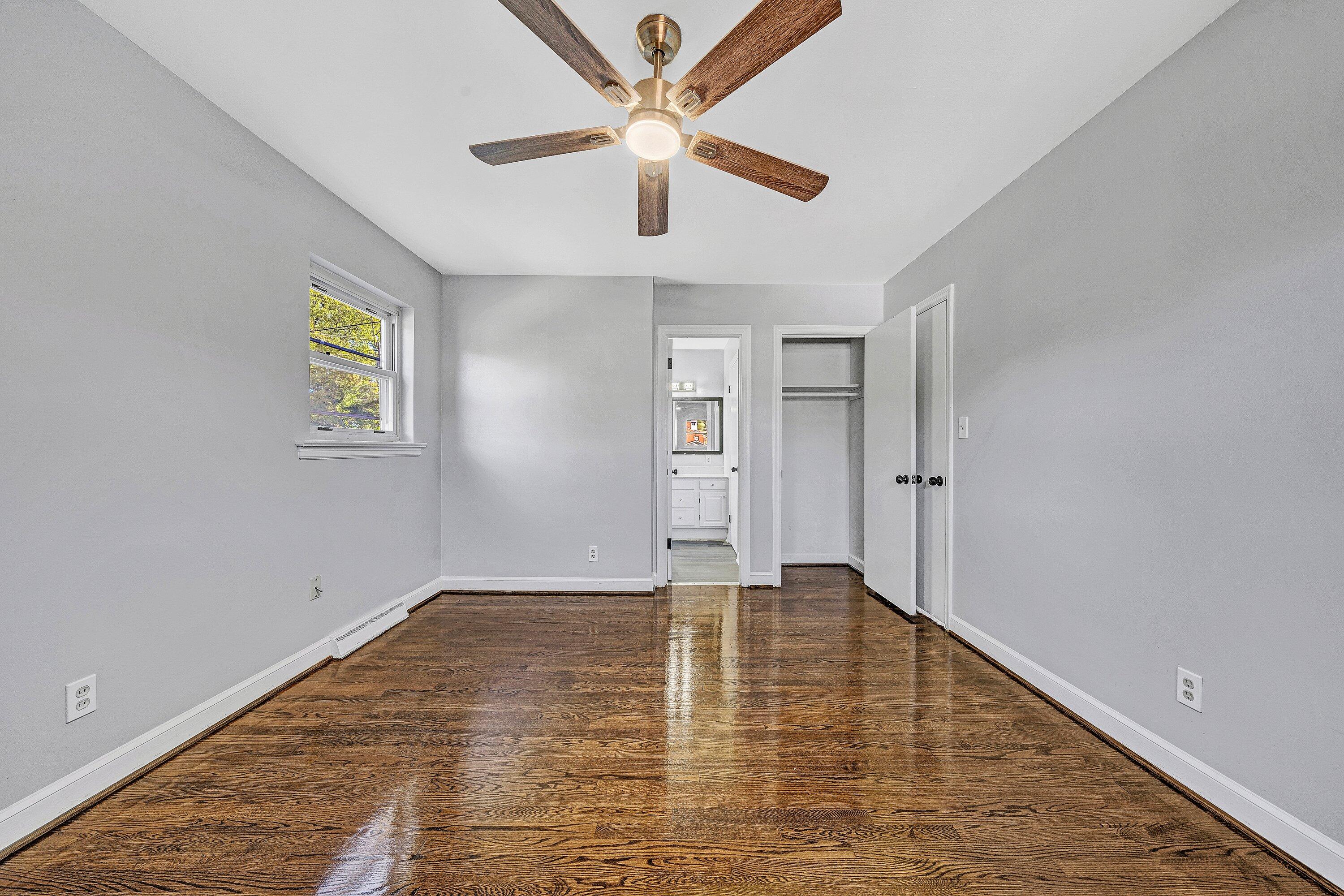 1633 Angus Road Northwest Roanoke, VA 24017 - Photo 12 of 22 an empty room with closet and ceiling fan