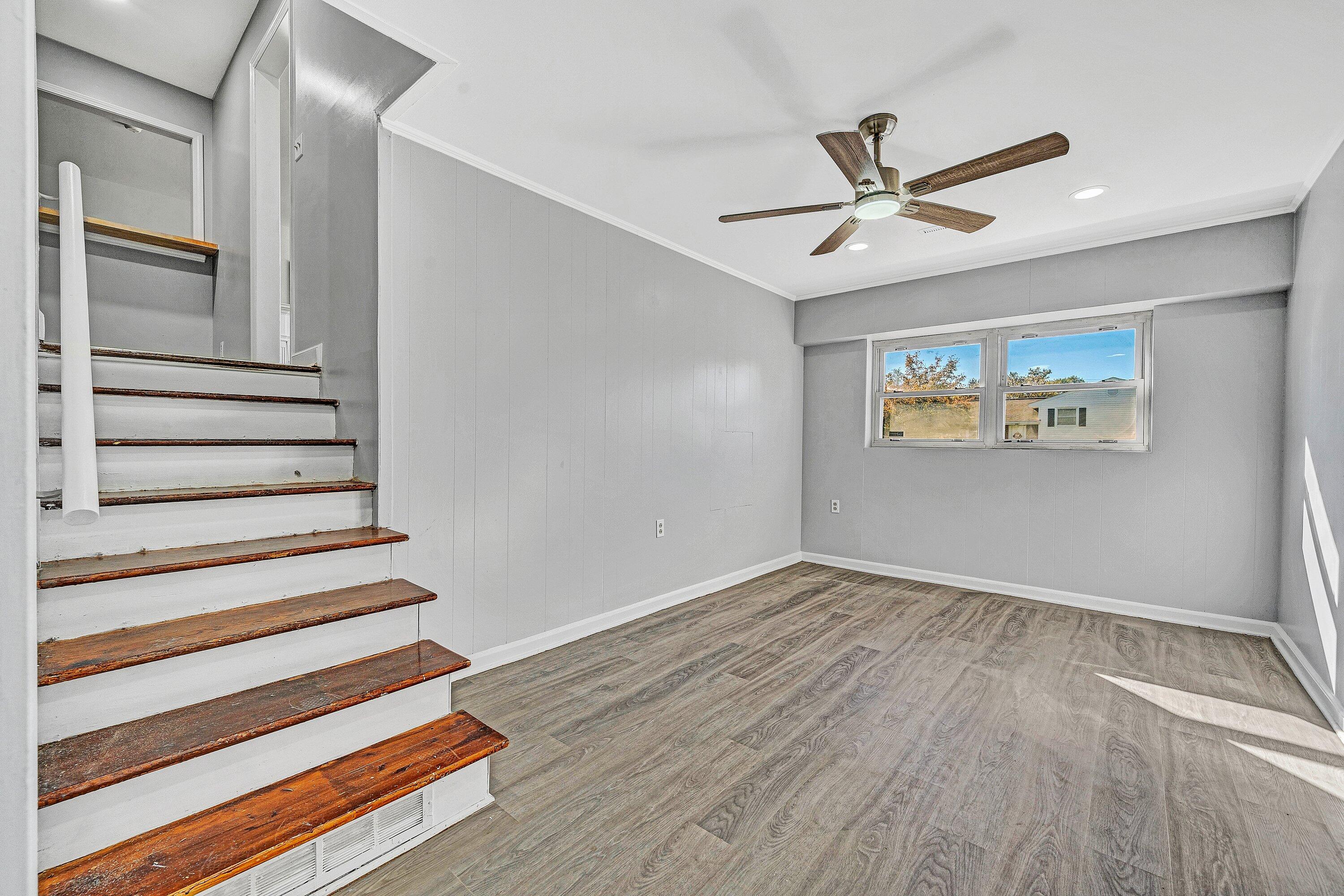 1633 Angus Road Northwest Roanoke, VA 24017 - Photo 15 of 22 a view of an empty room with wooden floor and a window